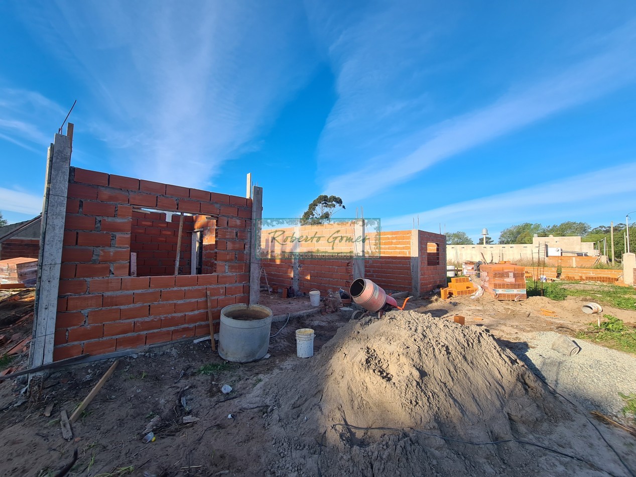 CHALET DE 3 AMBIENTES con 1/2 LOTE