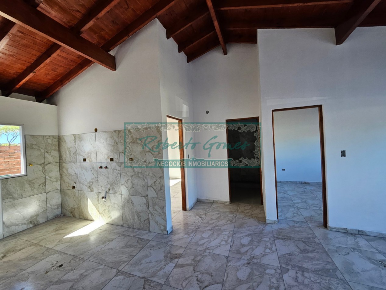 CHALET DE 3 AMBIENTES con 1/2 LOTE