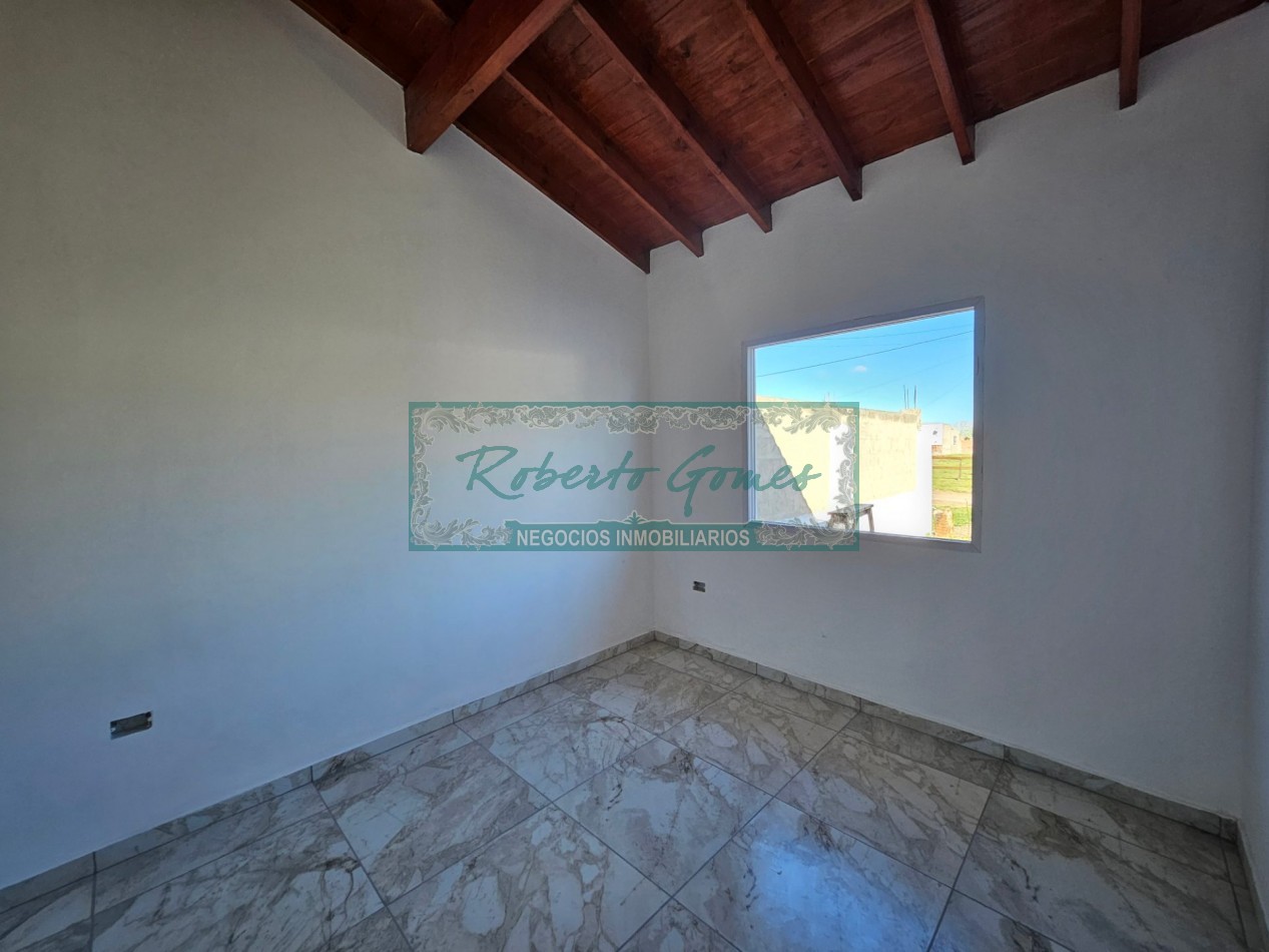 CHALET DE 3 AMBIENTES con 1/2 LOTE
