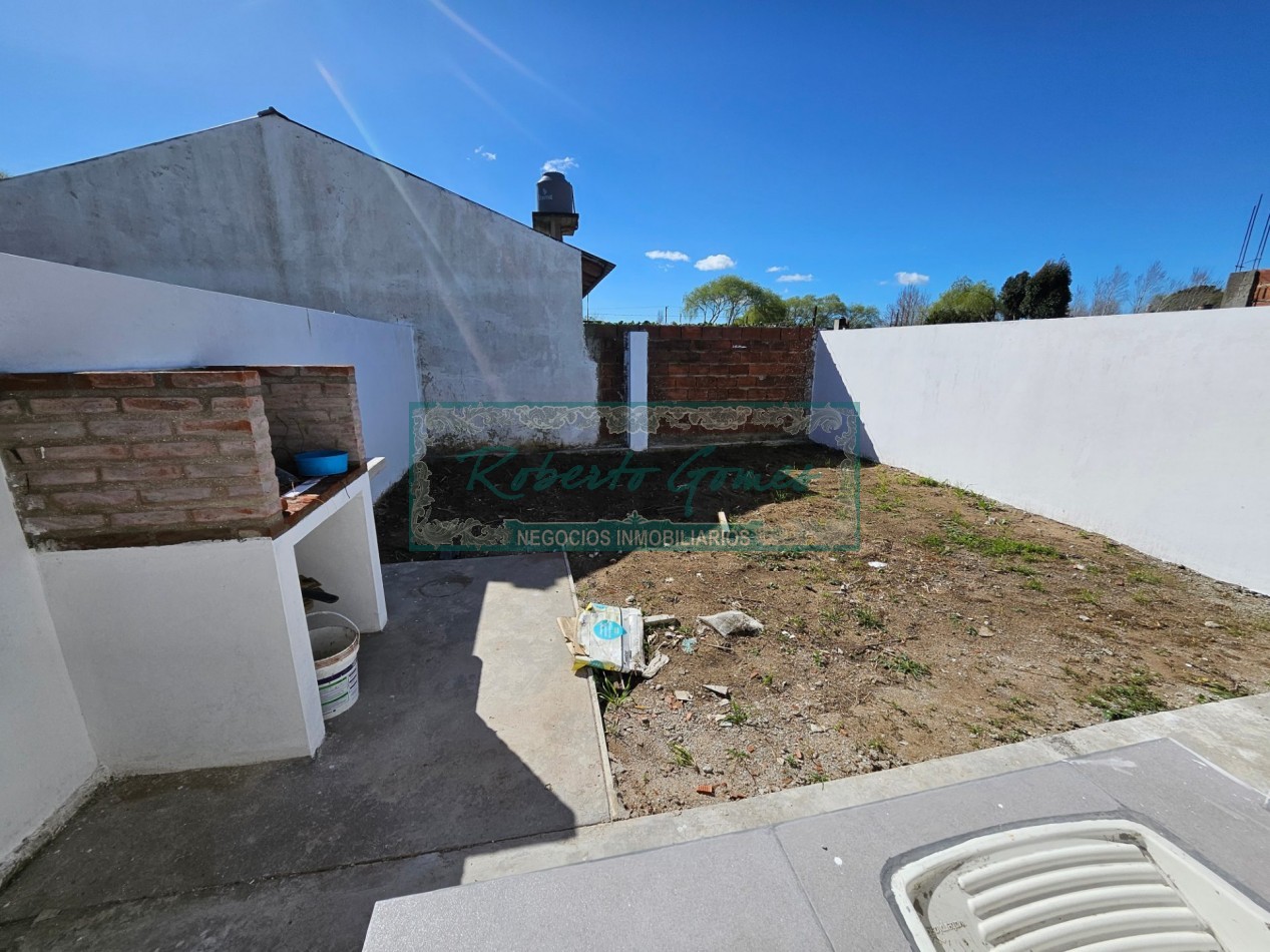 CHALET DE 3 AMBIENTES con 1/2 LOTE