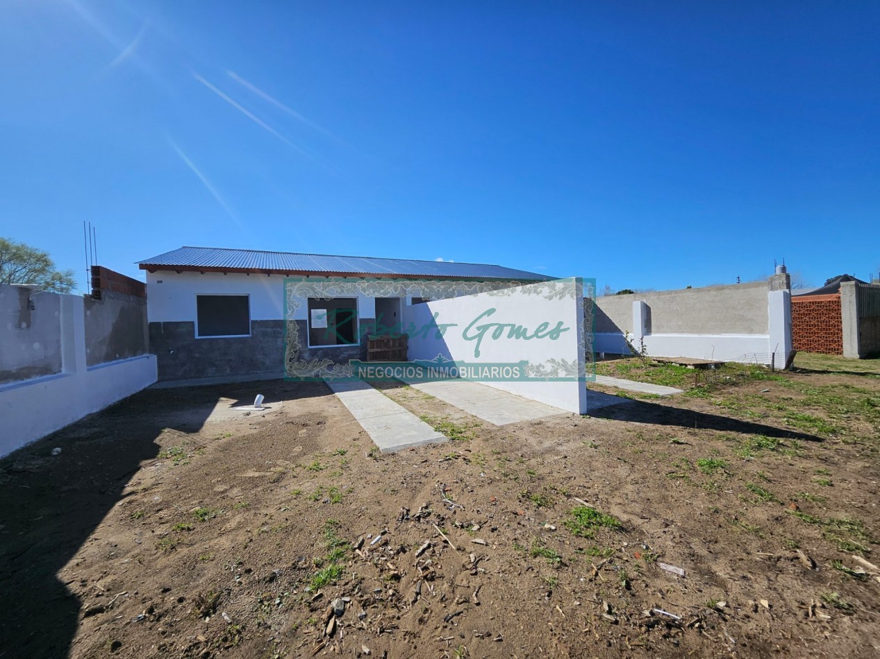 CHALET DE 3 AMBIENTES con 1/2 LOTE