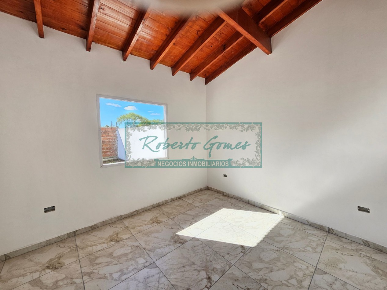 CHALET DE 3 AMBIENTES con 1/2 LOTE