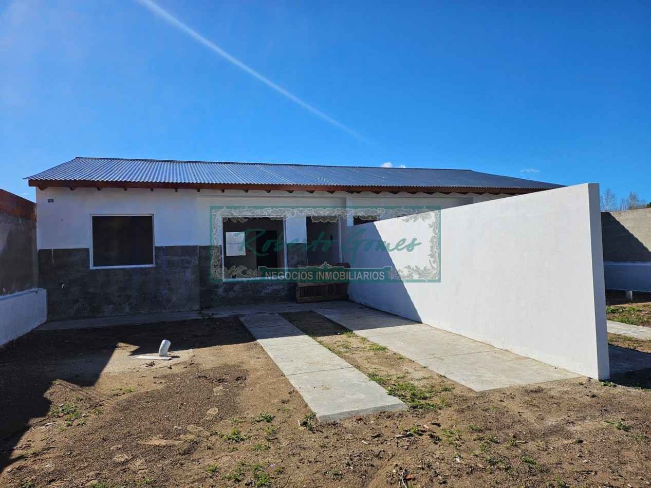 CHALET DE 3 AMBIENTES con 1/2 LOTE