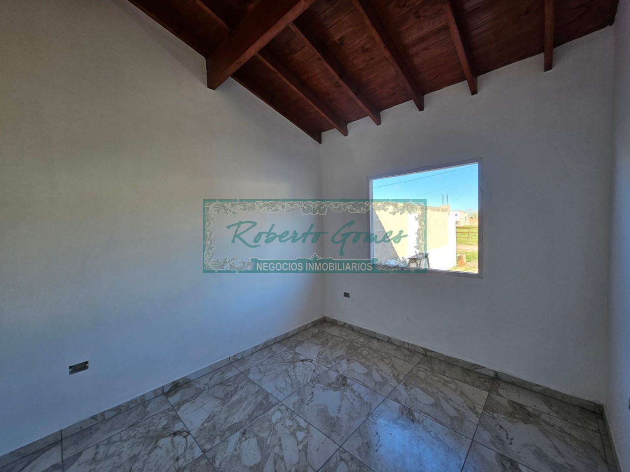 CHALET DE 3 AMBIENTES con 1/2 LOTE