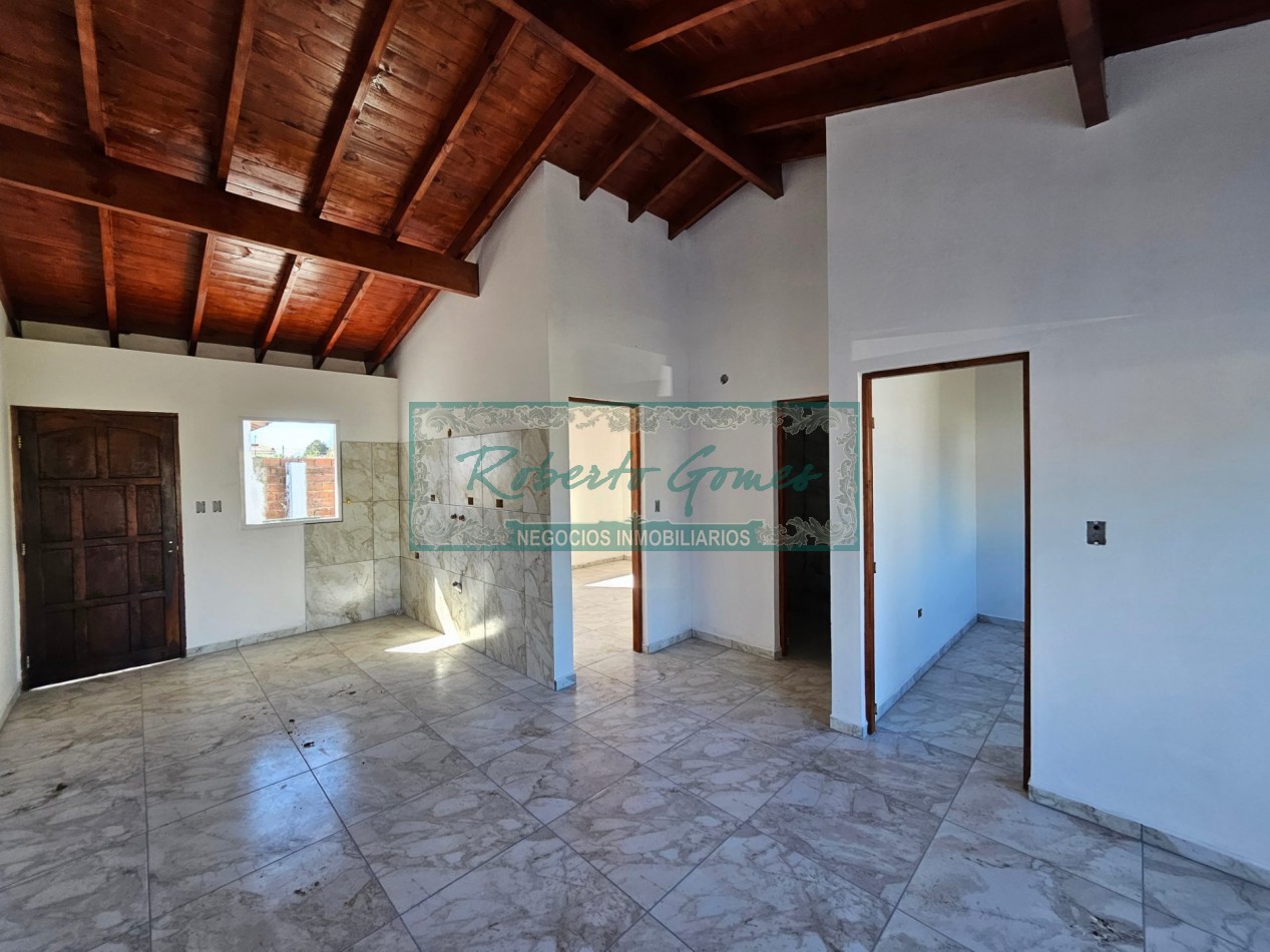 CHALET DE 3 AMBIENTES con 1/2 LOTE