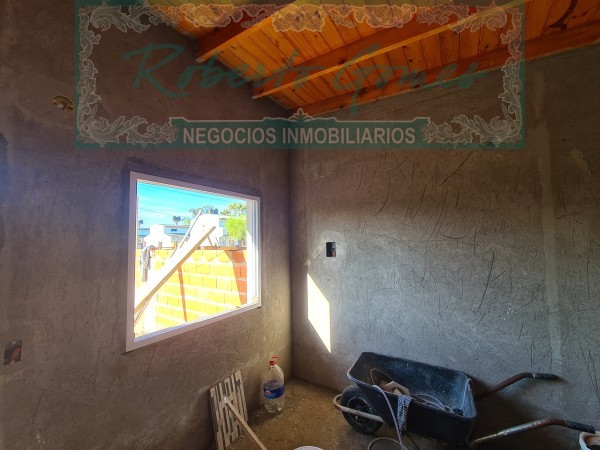 Hermoso chalet con 1/2 lote