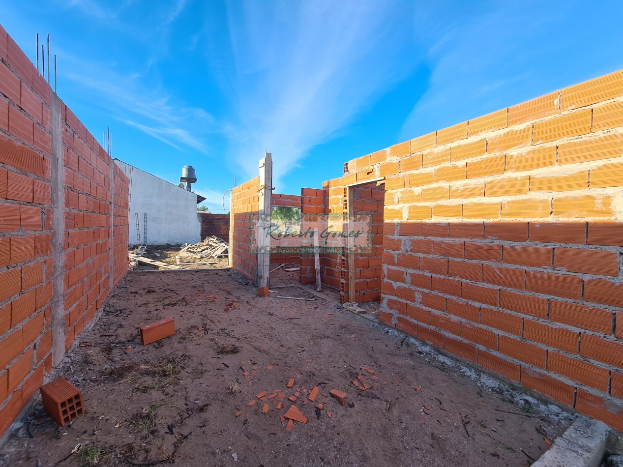 CHALET DE 3 AMBIENTES con 1/2 LOTE
