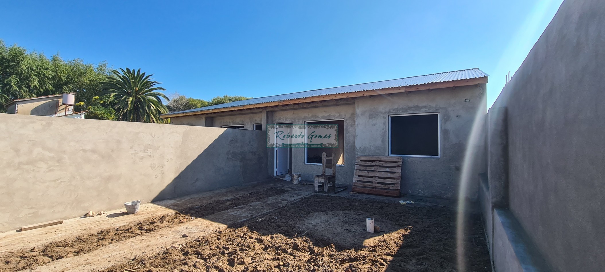 CHALET DE 3 AMBIENTES con 1/2 LOTE