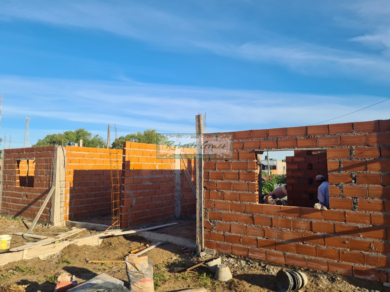 CHALET DE 3 AMBIENTES con 1/2 LOTE