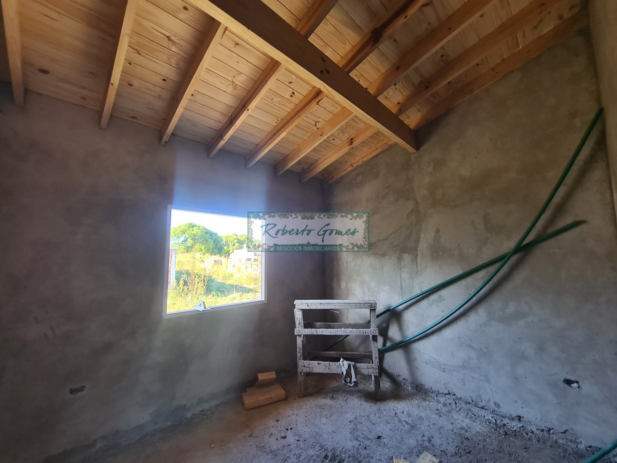 CHALET DE 3 AMBIENTES con 1/2 LOTE